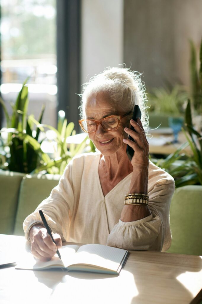 Senior woman busy on the phone